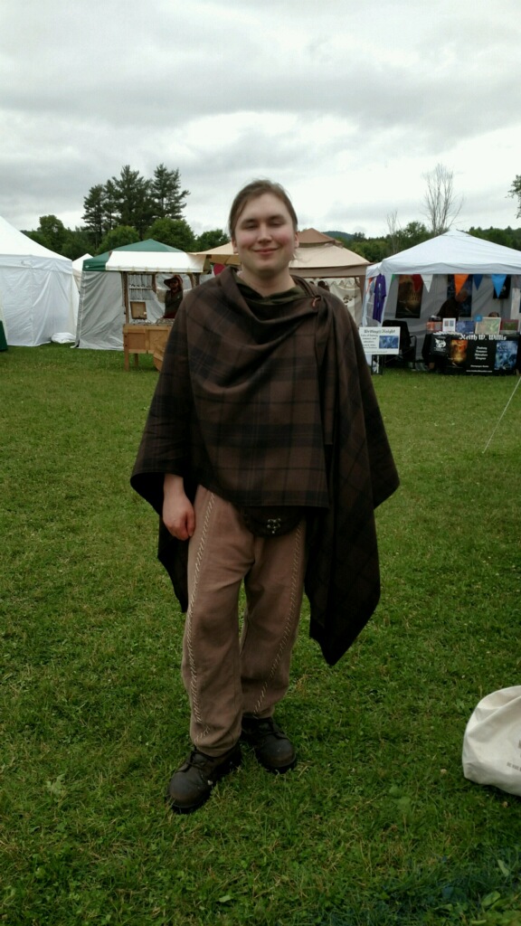 Picture of meself wearing a beautiful cloak at the Vermont Renfaire